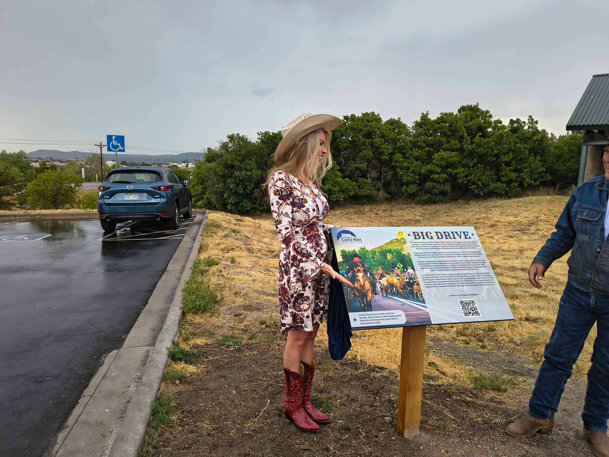 Laura Cavey unveiling the Big Drive interpretive sign at Rock Park Open Space in Castle Rock