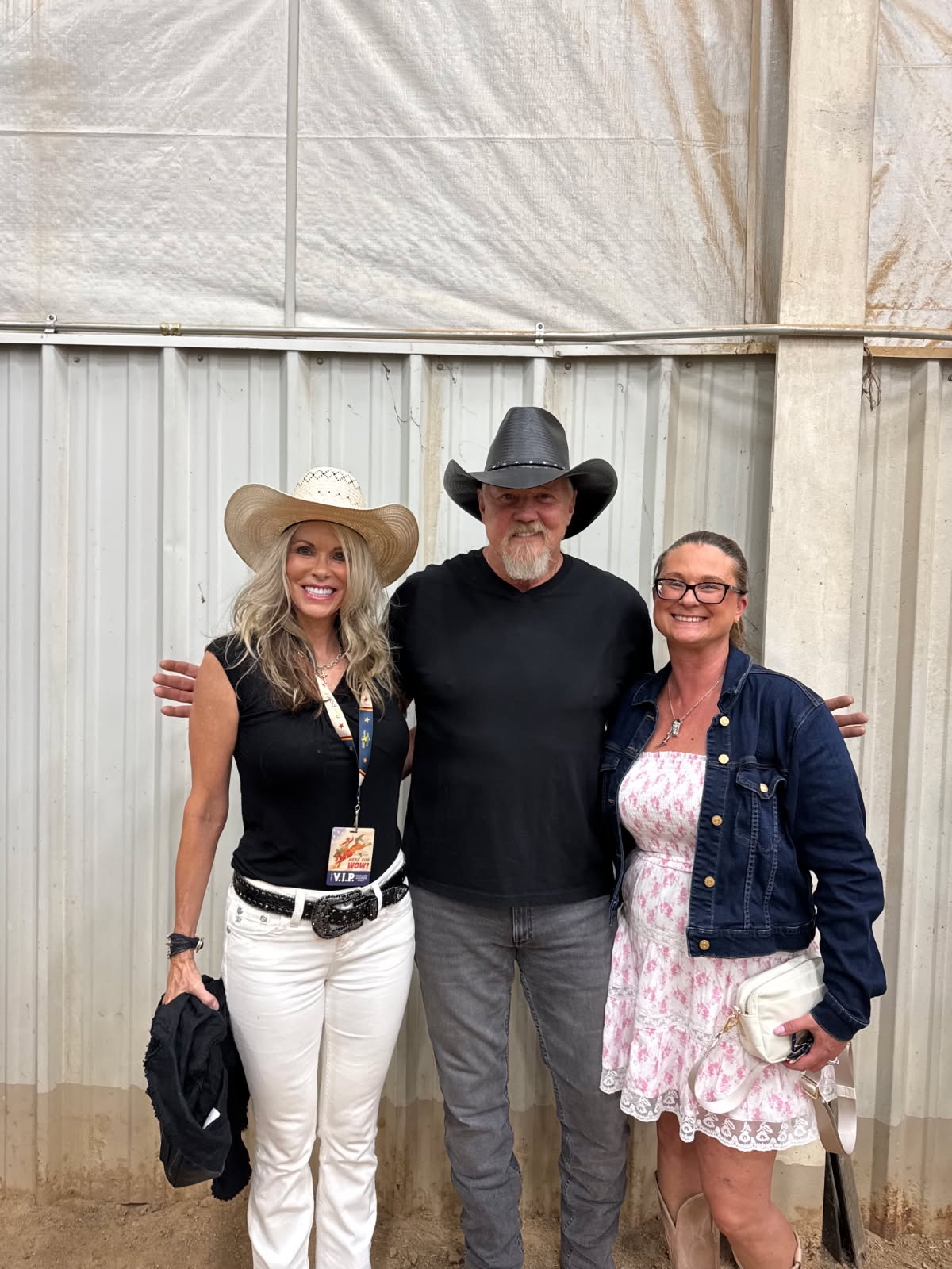 Laura Cavey in a white cowboy hat backstage with country star Trace Adkins at the Douglas County Fair & Rodeo on opening night